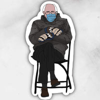 bernie sanders sitting with mask and mittens not giving a fox