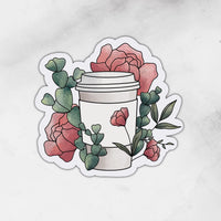 reusable coffee cup surrounded by florals